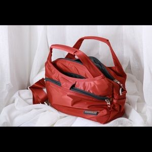 Crest Design red waterproof handbag